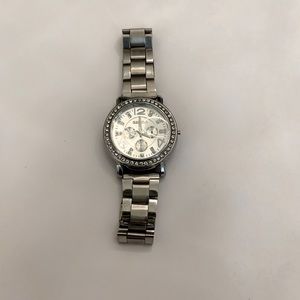 Sterling silver watch with diamond bezel